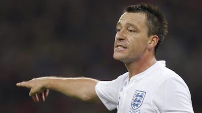 John Terry protests his innocence in the moments after his sending off for Chelsea against Barcelona.