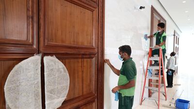 Workers add final touches to the interior. Some 900 tonnes of steel, 6,000 cubic metres of concrete and 1,500 square metres of marble has been used to build the temple.