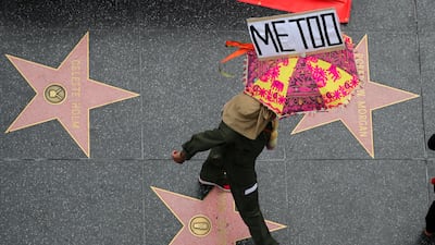 A demonstrator takes part in a #MeToo protest march for survivors of sexual assault and their supporters in Hollywood. REUTERS/Lucy Nicholson