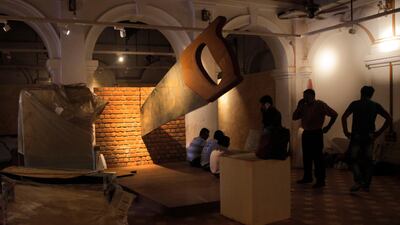 A giant saw installation. Rishabh R Jain / AP Photo