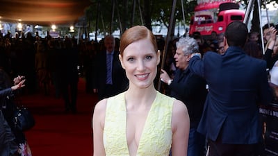 Jessica Chastain, in a light yellow Erdem gown with a plunging neckline, attends a screening of 'Wilde Salome' at BFI Southbank on September 21, 2014 in London. Getty Images