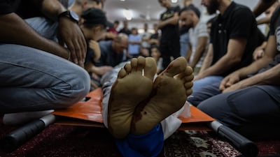 The community in Jenin refugee camp prepare to bury one of the men killed in the Israeli raid of November 2-3