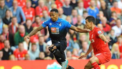 Dejan Lovren, right, in action against Bournemouth’s Callum Wilson, left. Peter Powell / EPA