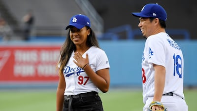 Osaka focuses ahead of her pitch. AP Photo