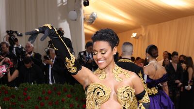 Ariana DeBose, wearing black and gold Moschino. EPA