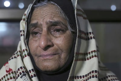 Indian passenger Abida Bano cries at Lahore railway station after learning the suspension of the Samjhuta Express that runs from Lahore to New Delhi. AP Photo