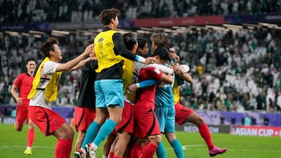 South Korea's players celebrate after the winning penalty in the shootout. AP