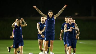 Leandro Paredes and Rodrigo De Paul warm up during the training session. Getty