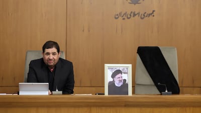 Iran's First Vice President Mohammad Mokhber, next to the empty seat of Mr Raisi, addresses the cabinet in Tehran. AFP