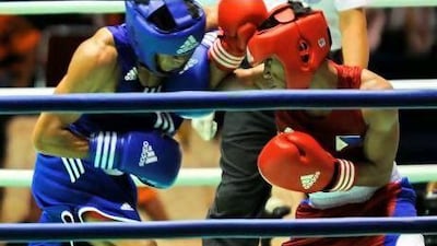 Mark Anthony Barriga, right, is a light-flyweight but will be carrying a heavy load as the Philippines's best hope for a medal at the London Summer Games.
