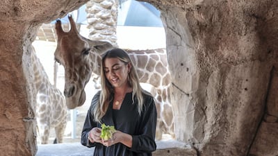Nine-year-old Abby Sneaks up on The National's Sophie Prideaux. Victor Besa/The National