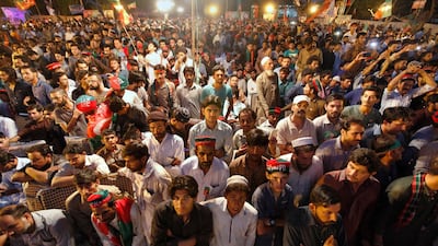 Supporters of Tehreek-e-Insaf party listen to their leader Imran Khan during an election campaign rally in Islamabad, Pakistan, Saturday, July 21, 2018. Anjum Naveed / AP