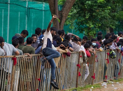 Cricket fans queue to buy tickets for the third Twenty20 cricket match between India and Australia at the Gymkhana grounds in Hyderabad, India. AP Photo