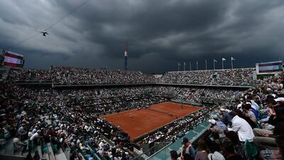 Kristina Mladenovic of France serves during the Ladies Singles third round match against Serena Williams of the United States on day seven of the 2016 French Open at Roland Garros on May 28, 2016 in Paris, France. (Photo by Dennis Grombkowski/Getty Images)