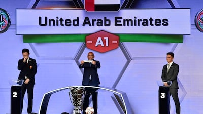 AFC general secretary Dato' Windsor John, centre, at the Asian Cup draw in the UAE in May, blamed a "computer glitch" for how the UAE and Palestine got to be left out of the Asian Games draw. AFP