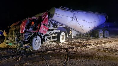 The driver had to be extracted from this lorry after it swerved off the road in Ajman. Ajman Civil Defence