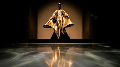 A golden haute couture dress by Pierre Cardin on display at the exhibition Pierre Cardin: Fashion Futurist at the Museum Kunstpalast in Duesseldorf, Germany, in September 2019. EPA