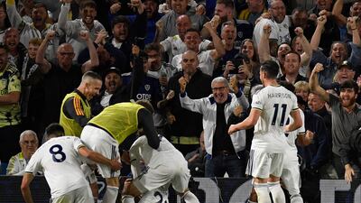 Leeds striker Luis Sinisterra is mobbed by teammates after scoring the equalising goal in the 1-1 draw against Everton at Elland Road on August 30, 2022. AFP