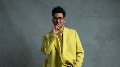 'Schitt's Creek' star Dan Levy wears yellow Valentino to attend the 78th annual Golden Globe Awards from home on February 28, 2021. Instagram