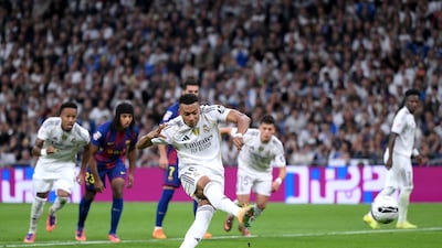 Real attacker Kylian Mbappe sees his penalty saved by Barca keeper Wojciech Szczesny. Getty Images