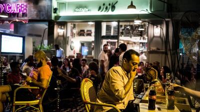 Packed with diners having drinks and smoking shisha, Kazouza attracts patrons who are there to enjoy the atmosphere as much as the food. David Degner for The National