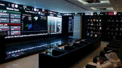 Screens displaying stock information at the Tadawul in Riyadh. The government is to list bonds and sukuk on the exchange. Faisal Al Nasser/Reuters