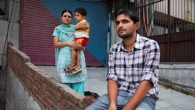 The Iceberg’s third officer, Jaswinder Singh, 26, has been held captive with 23 other crewmen for 16 months. His wife, Nirmal, 23, holds their son Abhimanyu, 2, alongside Jaswinder’s brother Rigan.