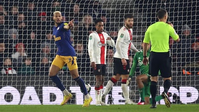 Newcastle's Joelinton celebrates before his earlier effort was disallowed. Reuters
