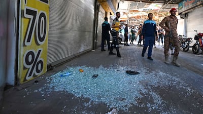 Smashed glass at the scene of the explosion in the Al Hijaz area of the city. AFP