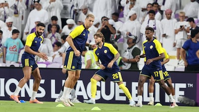 Al Nassr's Cristiano Ronaldo warms-up before the game at Hazza bin Zayed Stadium. Chris Whiteoak / The National