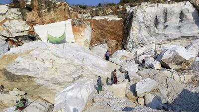 Workers labour at a marble mine at Zagyin village in the Madaya township. Soe Zeya Tun / Reuters