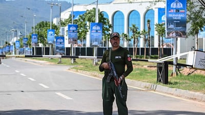 A Pakistani security officer near the Serena Hotel in Islamabad, the venue of the first round of talks between the US and Iran, on Sunday. AFP