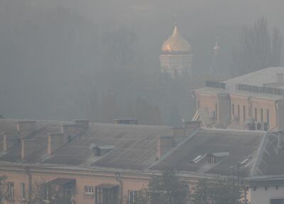 Smoke from forest fires around the Chernobyl nuclear plant shrouds Ukraine's capital Kiev on April 17, 2020. Reuters