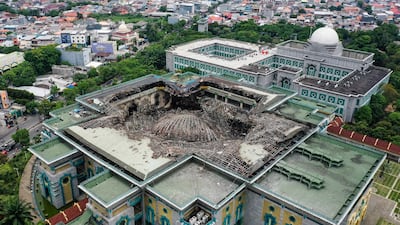 A photo taken with a drone shows the collapsed dome of the Jakarta Islamic Centre Grand Mosque. EPA