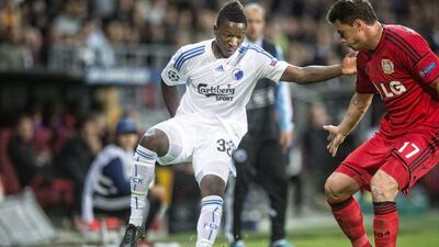 FC Copenhagen's Danny Amankwaa, left, vies with Bayer Leverkusen's Sebastian Boenisch, right, during their Uefa Champions League match on Tuesday. Jens Noergaard Larsen / EPA