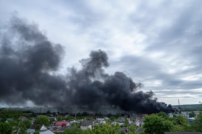 Smoke rises after a Russian attack in Kharkiv. Ukraine's President Zelenskyy said the situation there has been 'controlled' but 'not stabilised'. AP