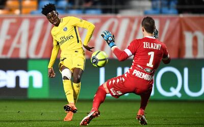 The presence of Timothy Weah, left, in the Paris Saint-Germain line-up will make some fans nostalgic. Franck Fife / AFP