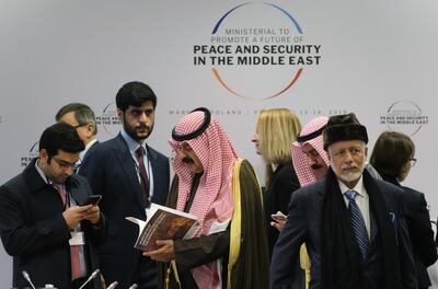 Participants arrive for the opening session of the Ministerial to Promote a Future of Peace and Security in the Middle East in Warsaw. Getty Images