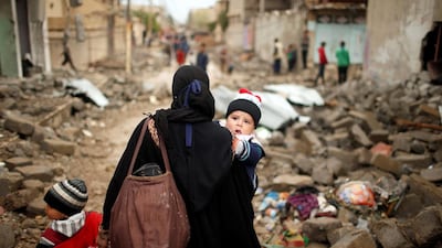 Displaced Iraqis flee their homes in western Mosul. A key aspect of this long-running war is the notion of keeping the states in which jihadis operate weak and unable to govern, or at least not govern the whole of a country. Suhaib Salem / Reuters