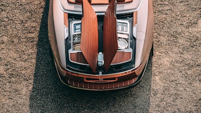 The rear deck has a butterfly opening action.