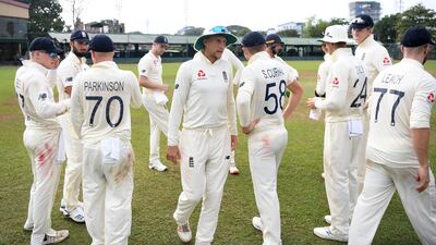 England captain Joe Root leads his team from the field after the tour match between SLC Board President's XI and England was abandoned on Friday. Getty