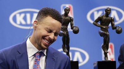 Golden State Warriors guard Stephen Curry smiles as he conducts interviews after receiving the NBA's Most Valuable Player award at a basketball news conference on Tuesday, May 10, 2016, in Oakland, Calif. (AP Photo/Marcio Jose Sanchez)