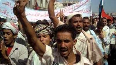 Yemeni men shout slogans during a demonstration against the unrest that has erupted in recent months in the impoverished south.