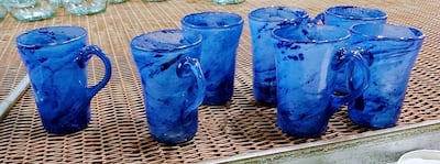 The shattered glass collected from the blast-affected areas in Beirut is being transformed into jugs, water bottles and coffee mugs. Courtesy Ziad Abi Chaker