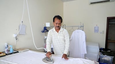 Ramdular Prasad says business is booming at the dry cleaning shop he works at in the village. Chris Whiteoak / The National