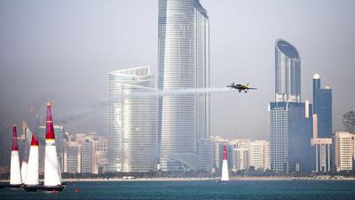 Qualifying for the Red Bull Air Race took place at Abu Dhabi's Corniche on Friday, much to the enjoyment of the thousands gathered in the area. In the air here is a pilot in the Challenger Race class. Lee Hoagland / The National