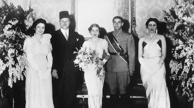 Queen Nazli of Egypt, right, had the necklace made for the wedding of Princess Fawzia, centre, and the rown Prince of Iran, Mohammad Reza Pahlavi, second right. Photo: Bettmann Archive