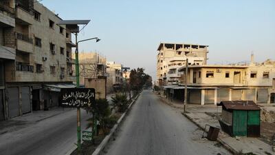 A drone picture shows empty streets and damaged buildings in the town of Maaret Al-Numan in the northwestern Idlib province. AFP