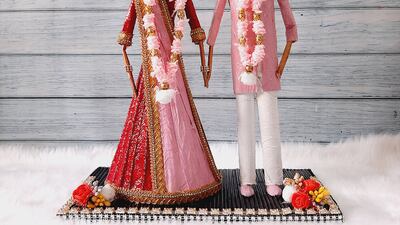 Wedding dolls are popular with her customers