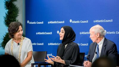 Shamma Al Mazrui, Minister of State for Youth Affairs, shared a platform in Washington DC with BBC journalist Kim Ghattas, left, and William Reese, the president and chief executive of the International Youth Foundation. Haitham Al Mussawi / UAE Embassy, Washington, DC